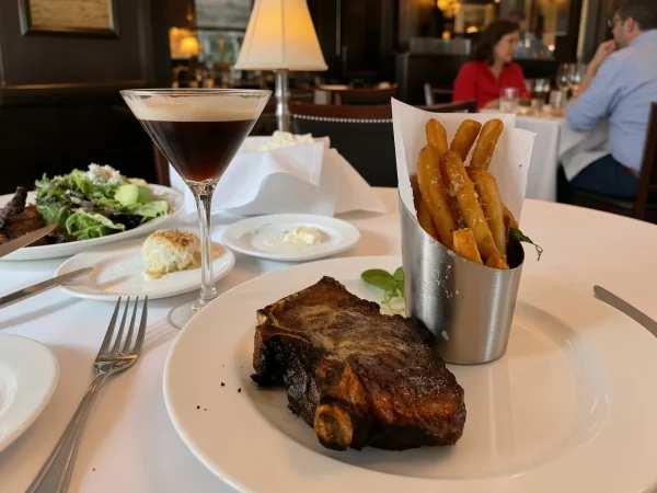 Bone-in ribeye, parmesan truffle fries and an espresso martini at The Capital Grille Dallas