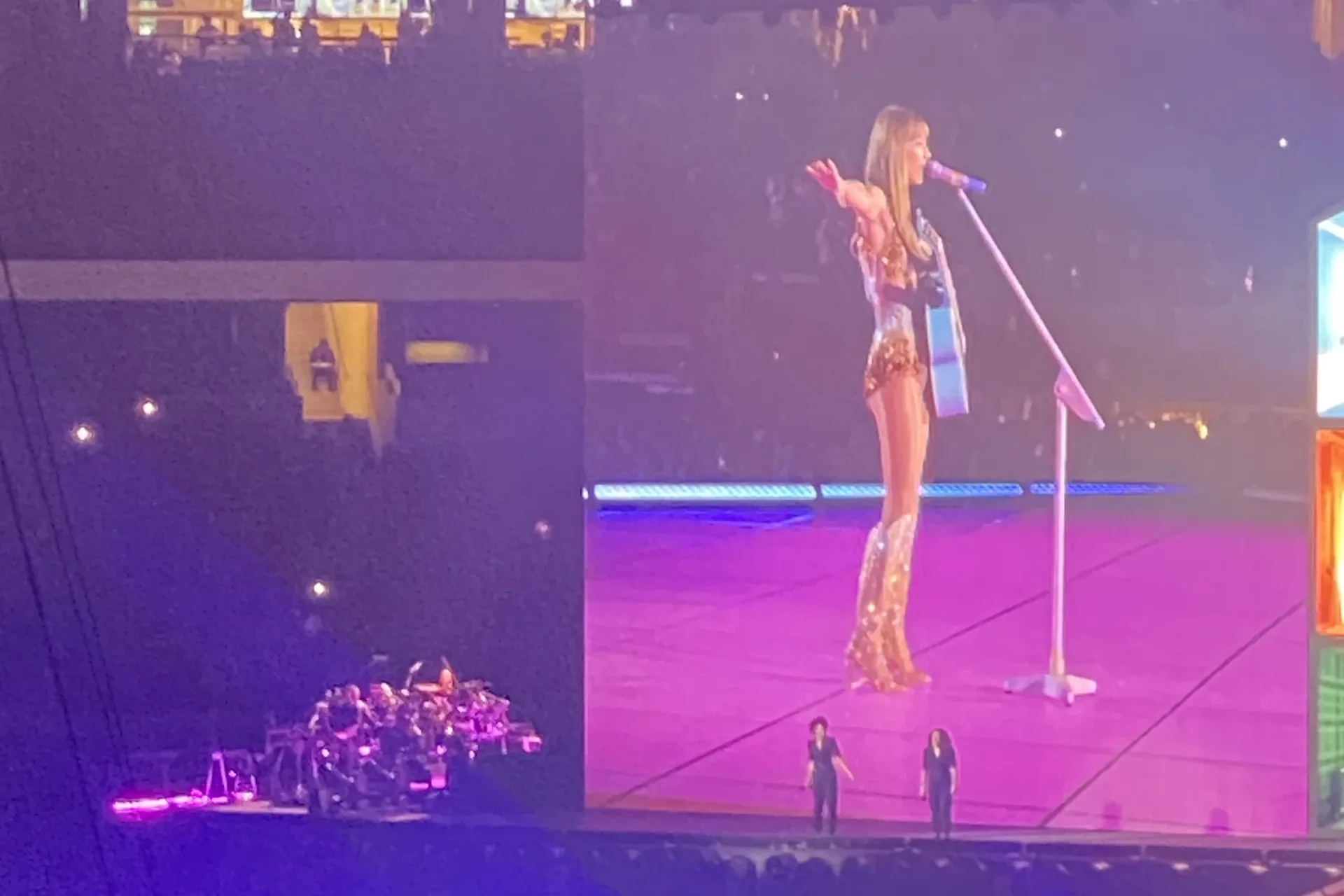 Concert Tickets - Blue guitar and sparkling boots on the pink stage and giant screen - Dallas VIP