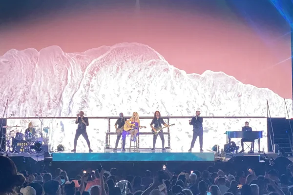 Concert Tickets - Full band acoustic set in front of a crashing wave on the arena video wall - Dallas VIP