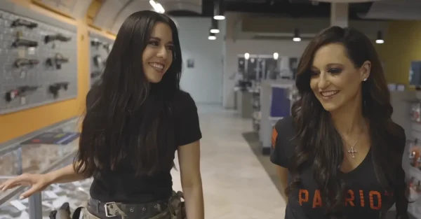 Frisco Gun Club - Two guests laughing their way through the gun store aisles - DallasVIP